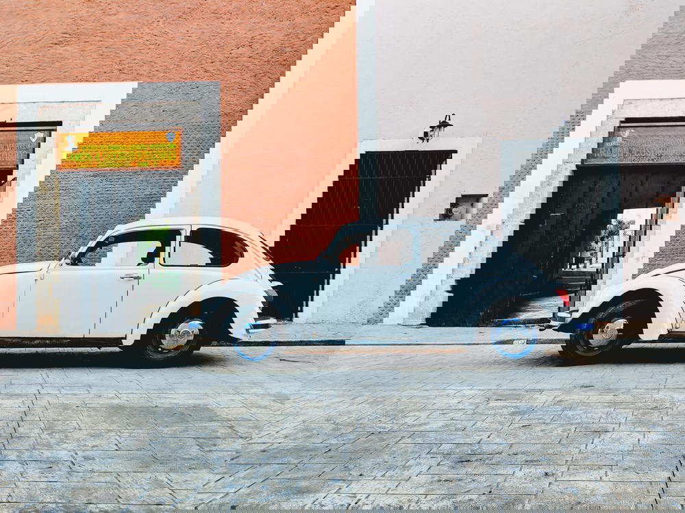 White vintage Volkswagen Beetle