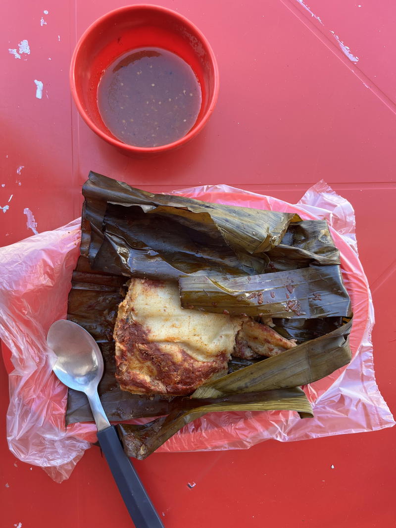 A plate of Mexican food on a red table in Merida.