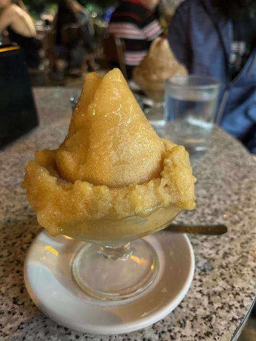A bowl of ice cream sitting on top of a table in Merida, Mexico.
