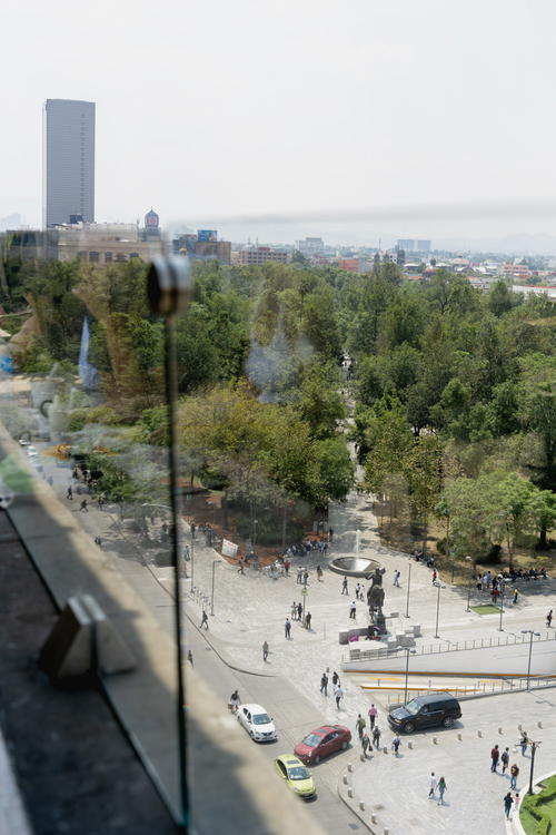 a view of a city from a window of a building