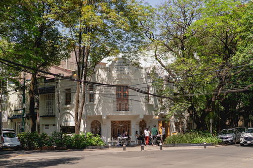 a group of people walking down a street