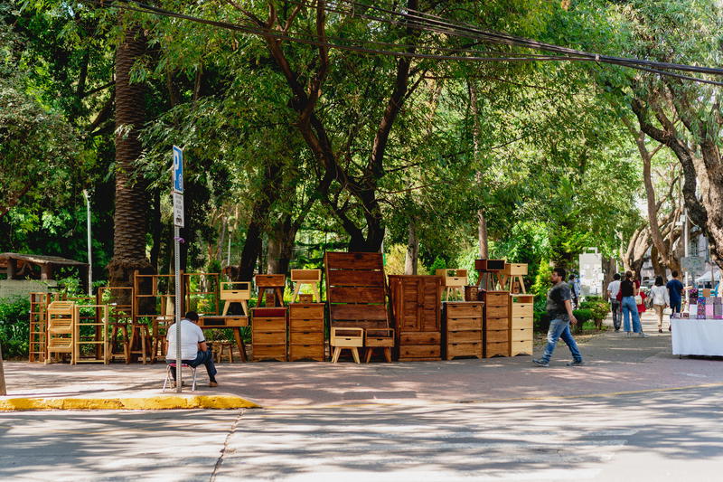 a group of people walking down a street