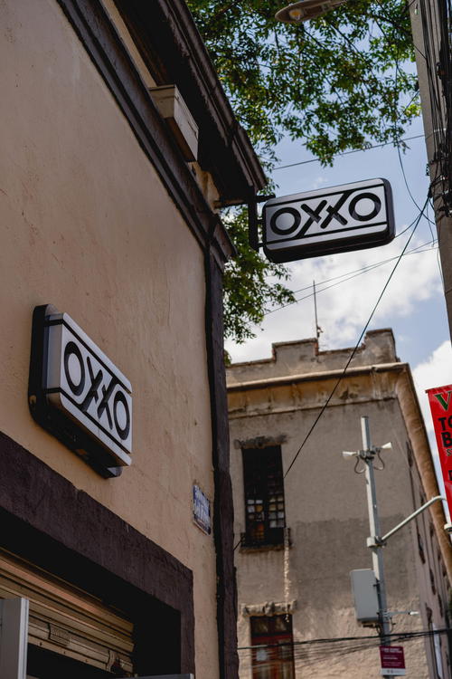 A building in Mexico City with a sign that says oxo.
