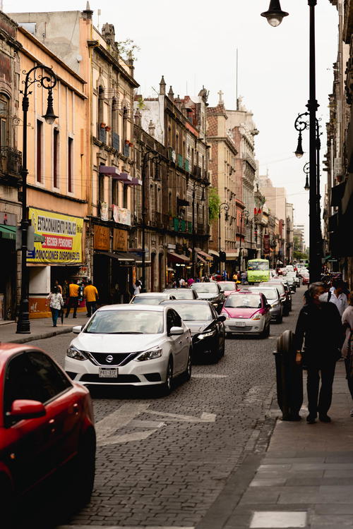 A red car in Mexico City.