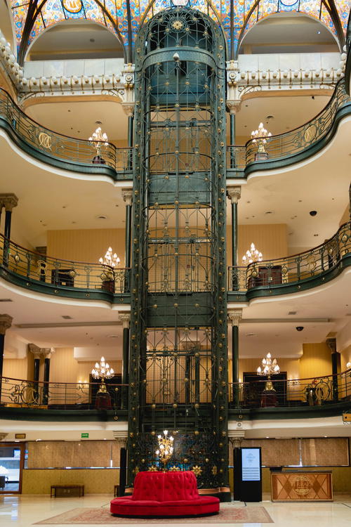 An ornate ceiling in a building located in Mexico City.