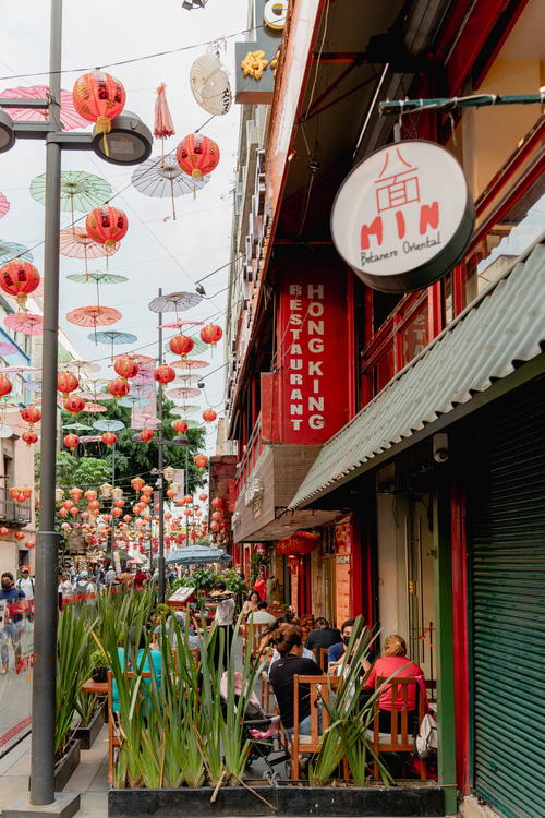 Chinese lanterns hanging over a street in Mexico City.