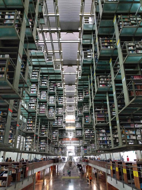 A vast library with numerous books nestled on shelves in Mexico City.