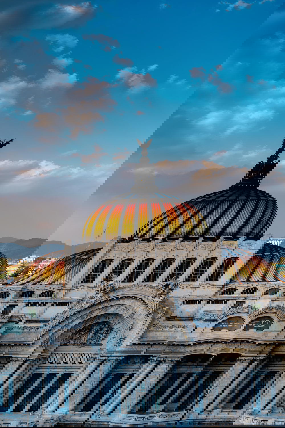 Palacio de Bellas Artes golden hour rainbown rooftop in Mexico City Centro Historico downtown