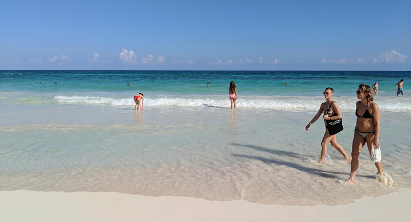 Tulum beach with some people