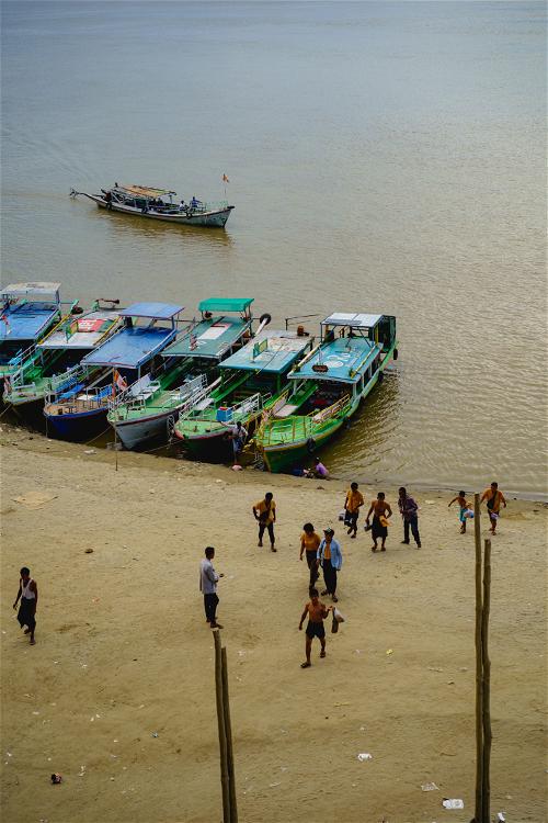 Boats docked on Irrawaddy River below Bu Paya Pagoda Bagan Myanmar Burma