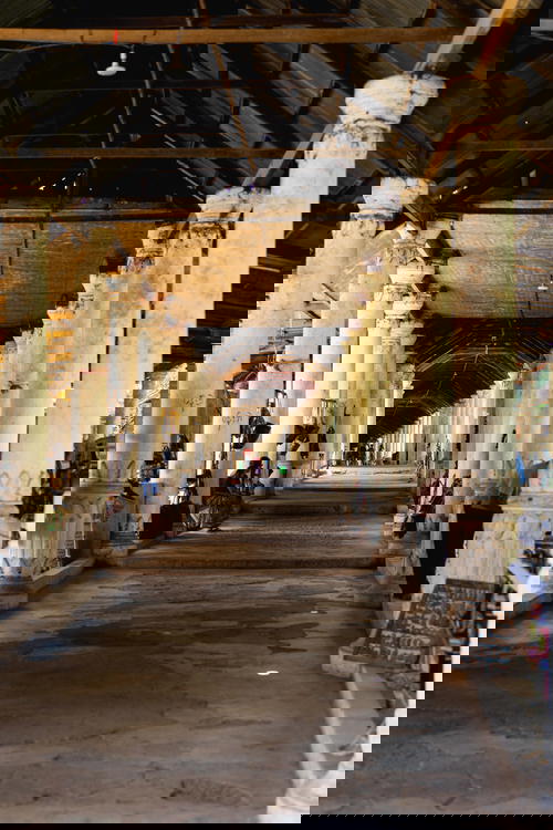 A long hallway with pillars in Myanmar (Burma).