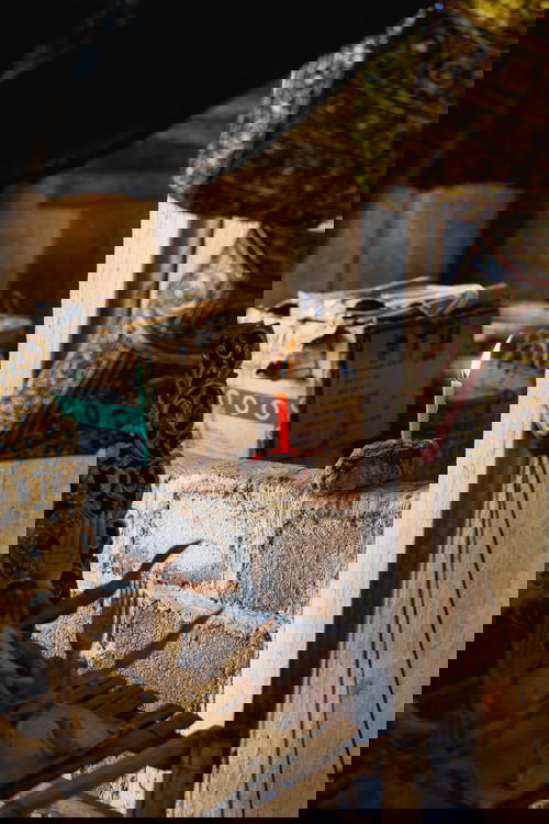 A candle is lit in a room in Myanmar (Burma).