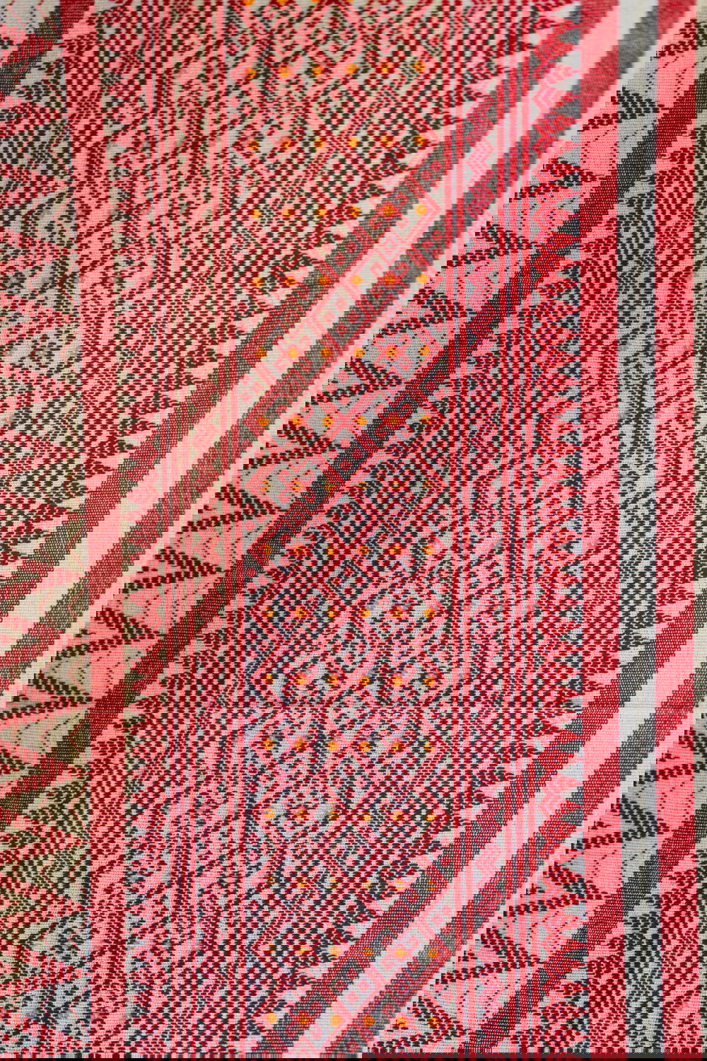Pattern rug fabric for sale in the village market of Indein Myanmar