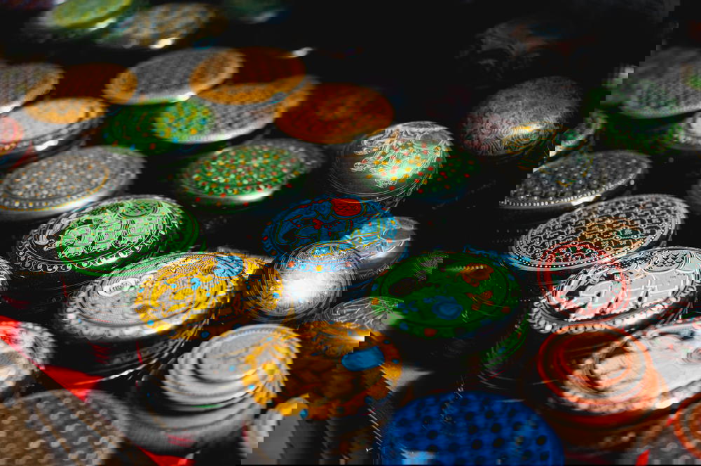 Painted handmade Burmese lacquerware for sale at a market in Indein Myanmar