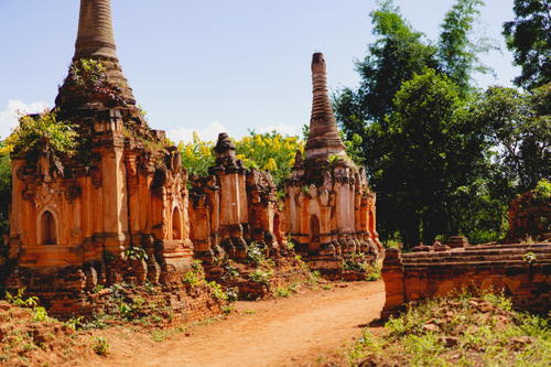 A dirt path leading to a group of Indian temples in Myanmar (Burma).