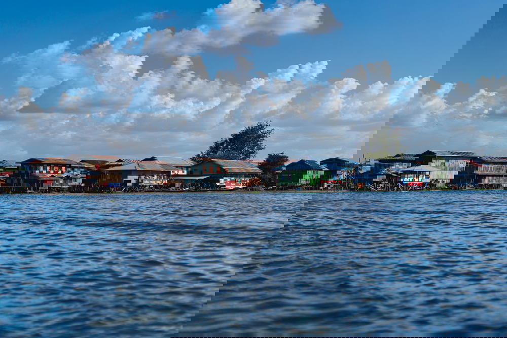 Burmese lake village homes made of wood along the waterways of Inle Lake Myanmar