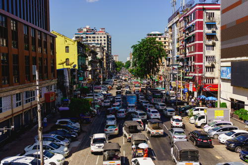 A bustling city street in Yangon, Myanmar (Burma).