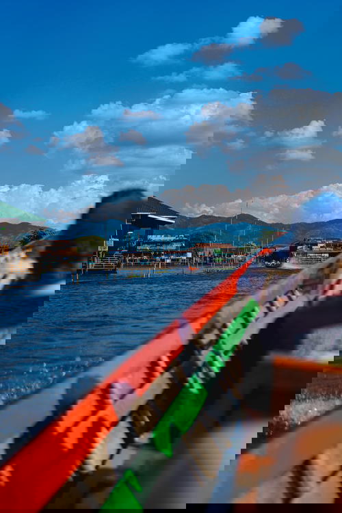 Group of travelers in boat tour at Inle Lake Myanmar