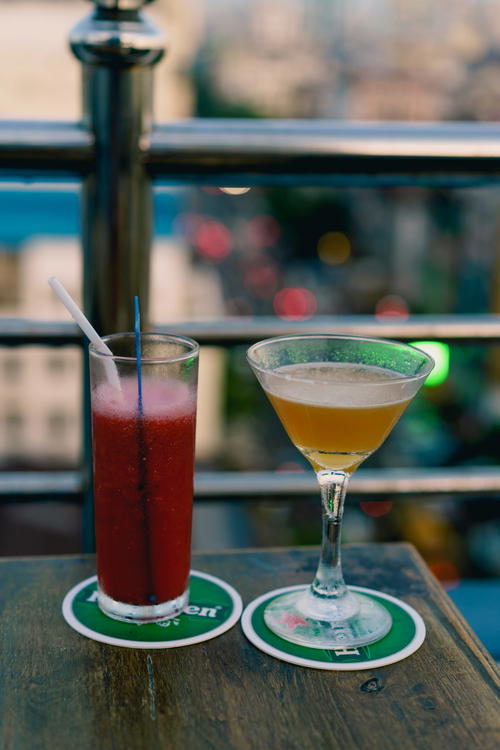 Watermelon juice and Mandalay Sour cocktail at best rooftop bar in Chinatown Yangon Myanmar Burma