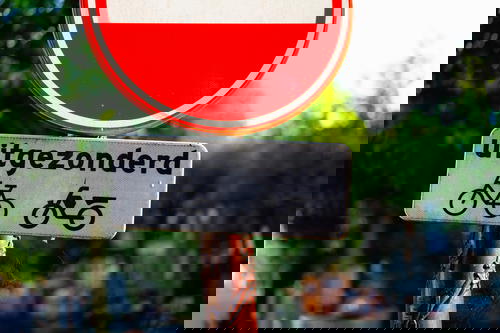 A Dutch street sign featuring a bicycle.