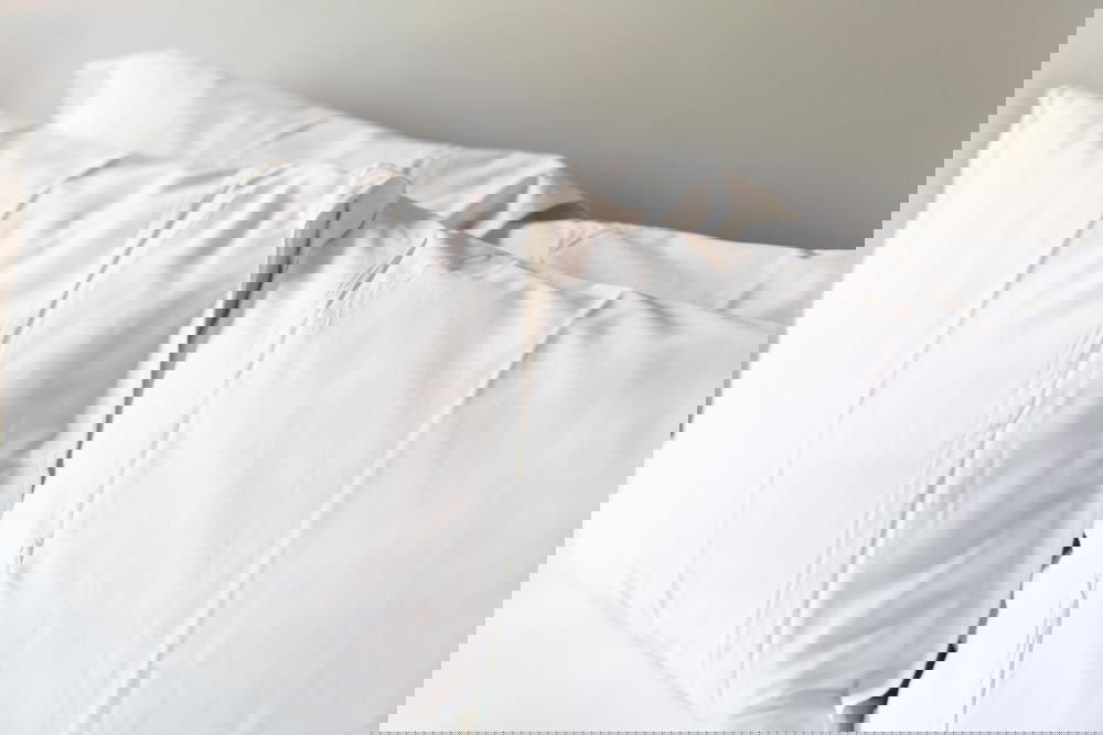 White pillows in a hotel room