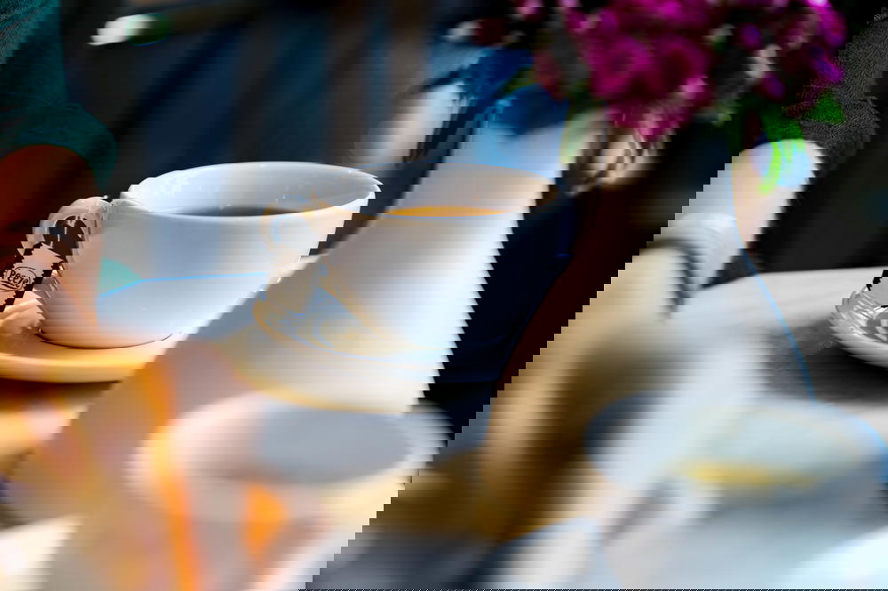 Woman and teacup at Lloyd Hotel, Amsterdam