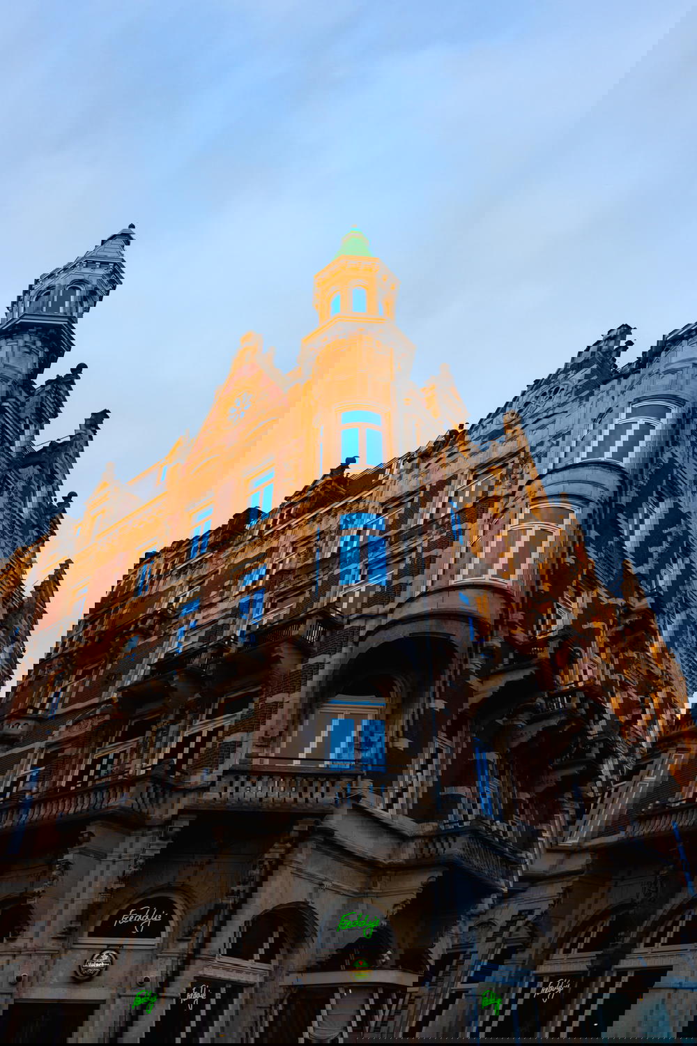 A clock tower in Amsterdam showcasing exquisite Dutch architecture.