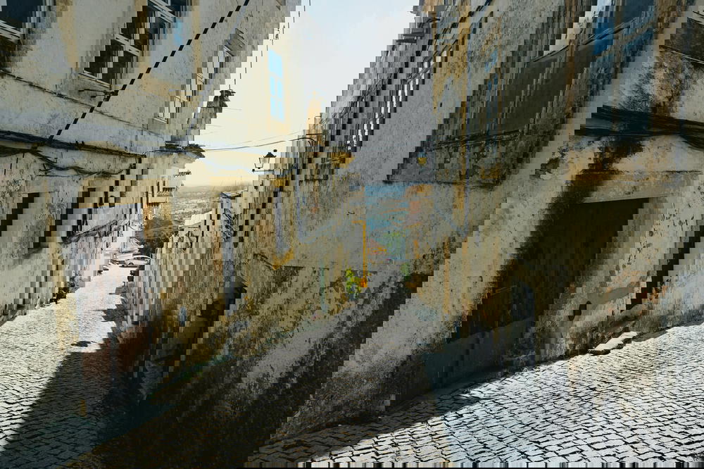 Cobblestone streets leading to views in Portalegre, Portugal