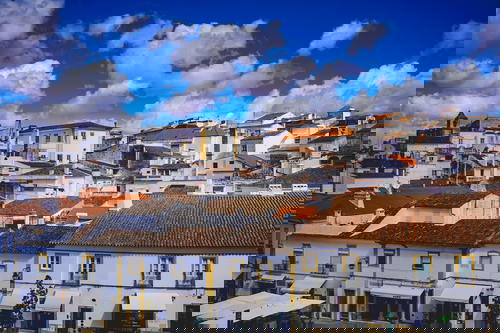 Rows of white homes and buildings in Evora