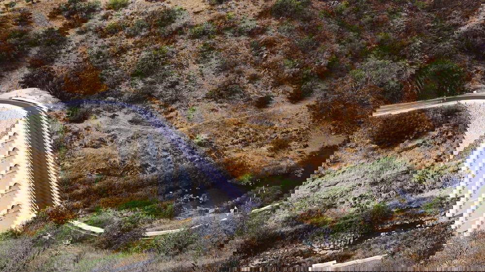 An aerial view of a bridge over a river in Portugal.