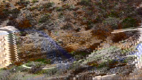 An aerial view of a bridge over a river in Portugal.