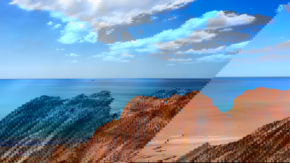 A rocky cliff overlooking the ocean in Portugal.