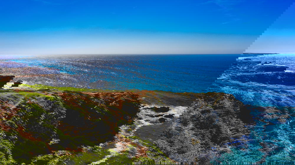 A view of the ocean from a cliff in Portugal.