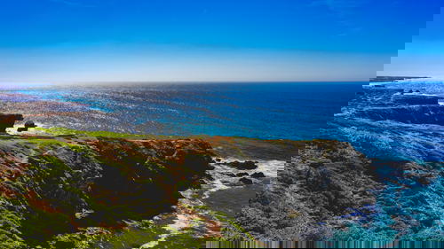 A view of the ocean from a cliff in Portugal.