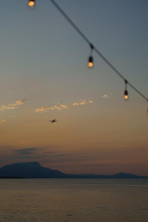Tea lights at beautiful sunset on beach in Sosua Dominican Republic