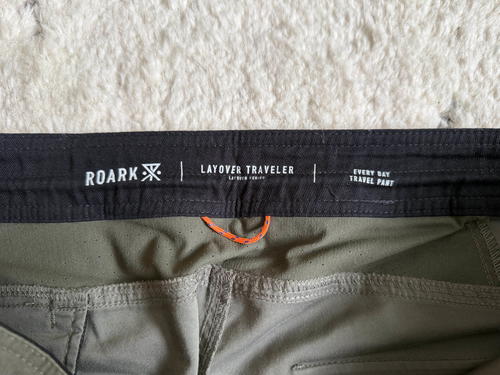 a pair of pants with the logo on them