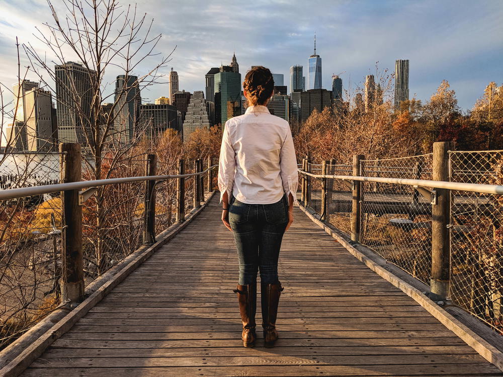 Back of a woman wearing a white shirt from UNTUCKit