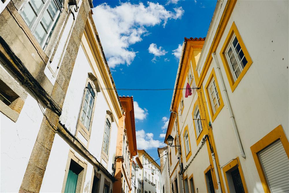 A narrow street in lisbon, portugal.