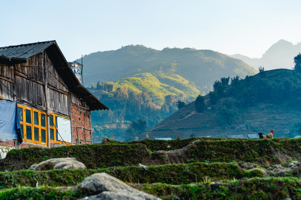 A wooden building with a window.