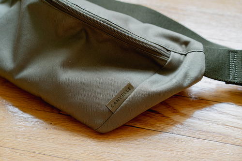 a close up of a bag on a wooden floor