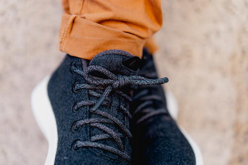Close up of the Allbirds runner up mizzles in dark gray