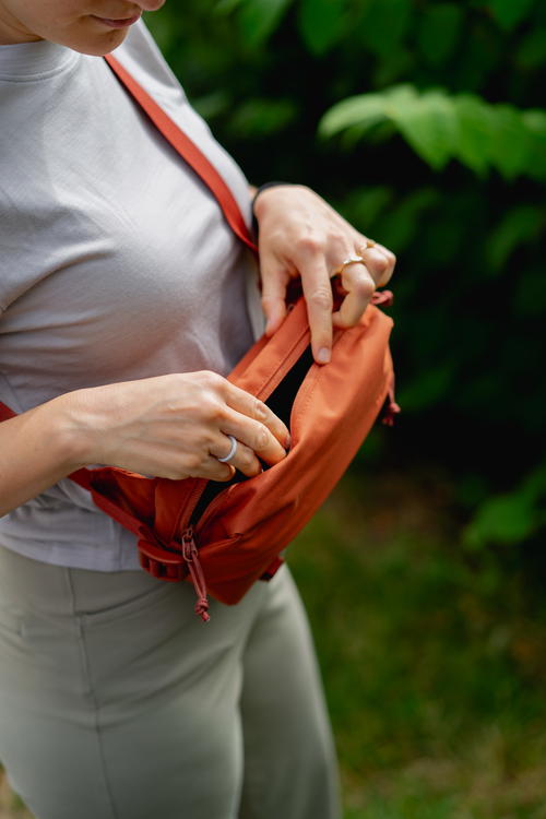 the only 2 ways I carry while driving is this and aiwb, this is a sling bag  I'm about to try a good fanny pack any good one out there that doesn't