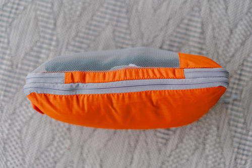 Side view of the orange Bagsmart travel packing cube