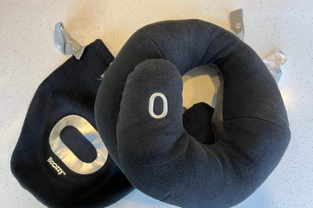 Bcozzy travel pillow on a white surface