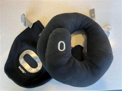 Bcozzy travel pillow on a white surface
