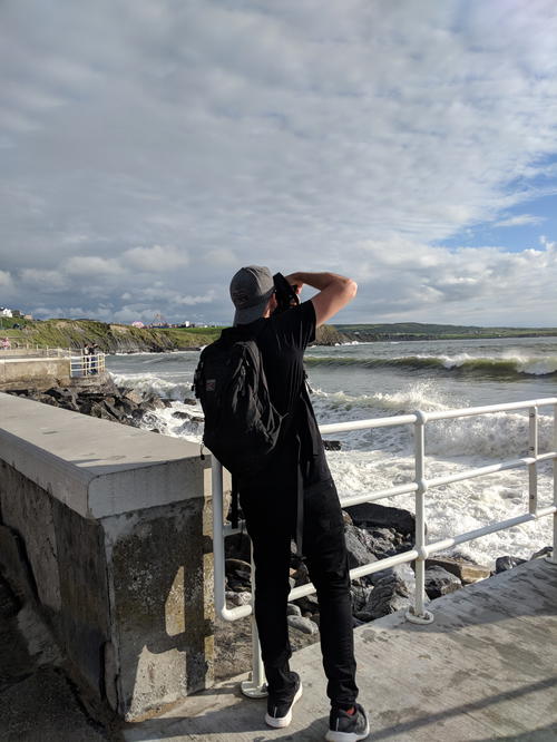 Man in ireland taking photos wearing duer performance denim