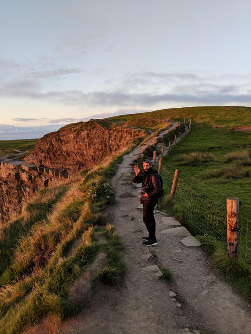 Man walking in ireland with DUER performance denim.