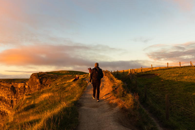 Man walking in ireland with DUER performance denim