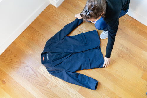 Folding a Bluffworks suit jacket