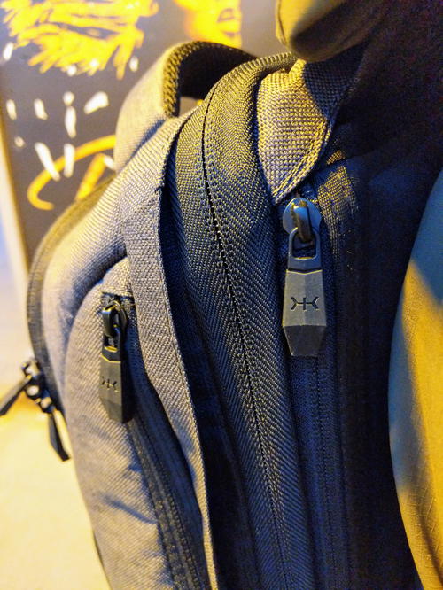 Zipper close up of the main compartment on the gray Small Expandable Knack Pack